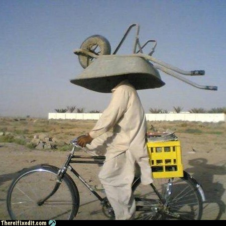 http://uberhumor.com/wp-content/uploads/2012/03/white-trash-repairs-there-i-fixed-it-it-also-works-as-a-hat.jpg
