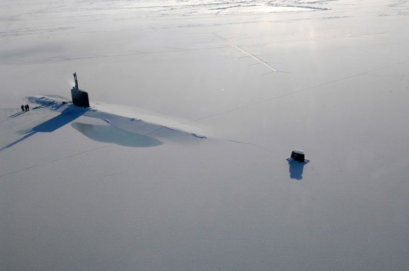 http://coolandfunny.net/wp-content/uploads/2015/03/12-A-submarine-surfaces-through-Arctic-ice.jpg